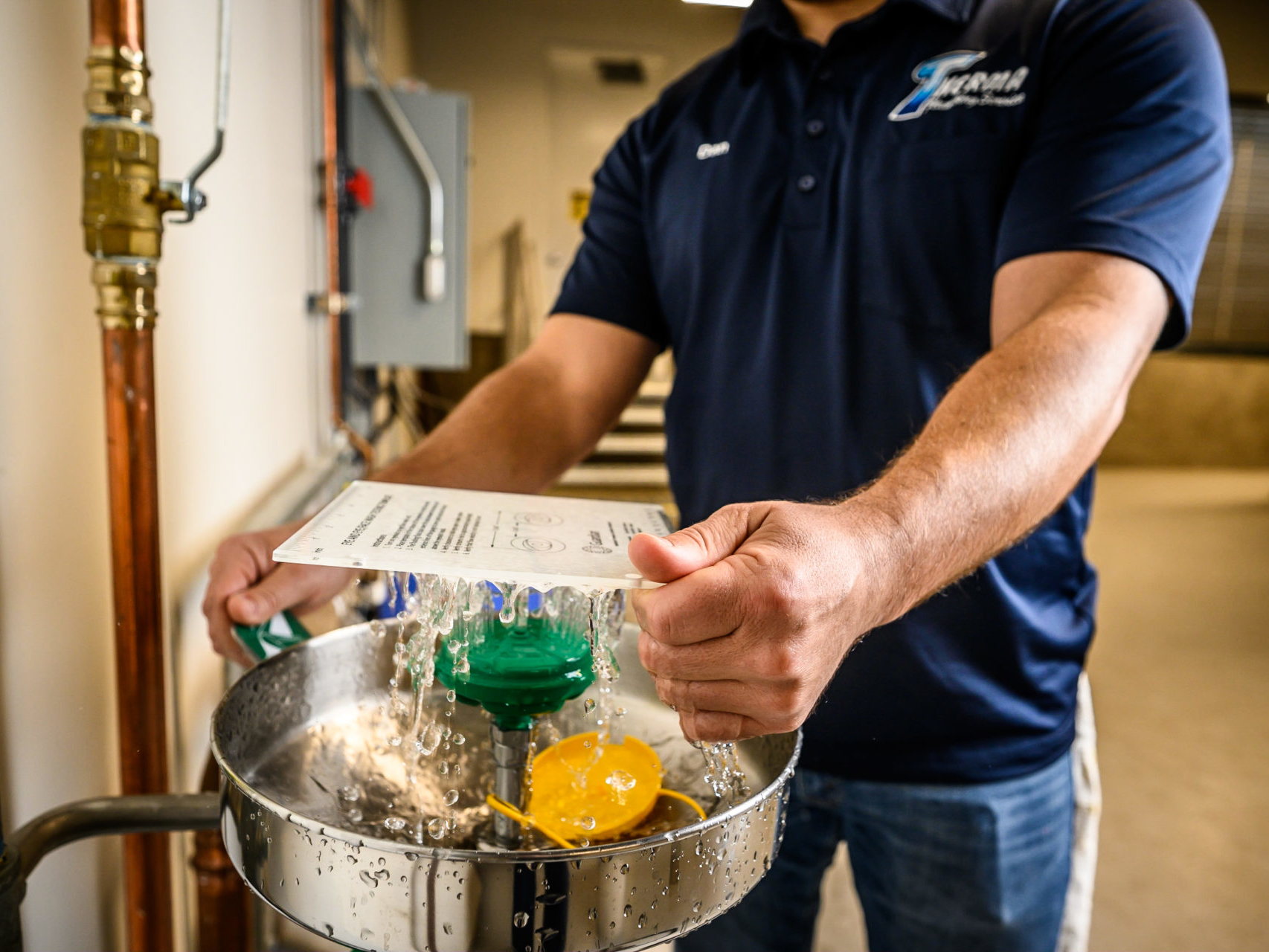 Man testing running water